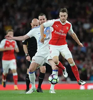 Arsenal V Sunderland 2016-17 Prints: Arsenal's Aaron Ramsey Faces Off Against Sunderland's John O'Shea in Premier League Showdown