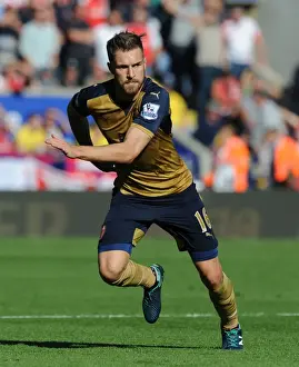 Leicester City V Arsenal 2015/16 Prints: Arsenal's Aaron Ramsey Goes Head-to-Head with Leicester City in Premier League Showdown (2015/16)