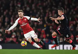 Arsenal V Huddersfield Town 2017-18 Prints: Arsenal's Aaron Ramsey Outmaneuvers Huddersfield's Jonathan Hogg in Premier League Clash