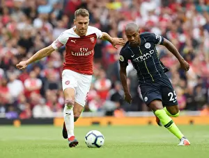 Arsenal's Aaron Ramsey Outmaneuvers Manchester City's Fernandinho in Premier League Showdown