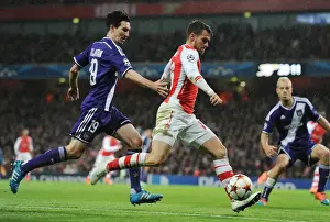 Arsenal V Anderlecht 2014/15 Prints: Arsenal's Aaron Ramsey Outmaneuvers Sacha Kljestan in Champions League Clash