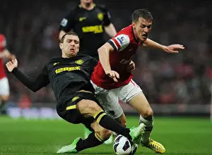 Arsenal V Wigan Athletic 2012-13 Prints: Arsenal's Aaron Ramsey Outmaneuvers Wigan's James McArthur