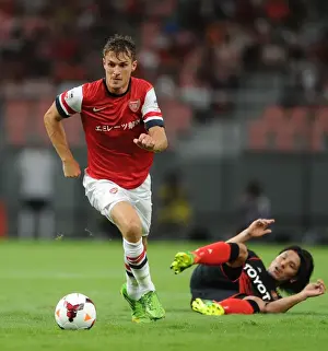 Nagoya Grampus V Arsenal 2013-14 Prints: Arsenal's Aaron Ramsey Outsmarts Jungo Fujimoto: Pre-Season Victory over Nagoya Grampus (July 2013)