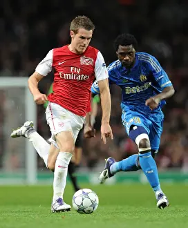 Arsenal V Marseille 2011-12 Prints: Arsenal's Aaron Ramsey Outsmarts Marseille's Koulouté in 2011-12 Champions League Showdown