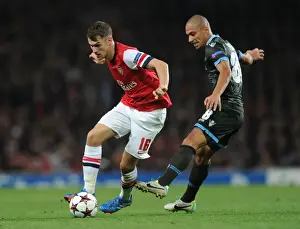 Arsenal V Napoli 2013-14 Prints: Arsenal's Aaron Ramsey Outwits Napoli's Gokhan Inler: A Moment of Genius in the Champions League Clash