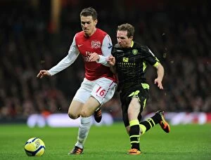 Arsenal v Leeds United FA Cup 2011-12 Collection: Arsenal's Aaron Ramsey Scores Past Leeds Aidan White in FA Cup Clash