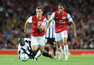 Arsenal V Udinese 2011-12 Prints: Arsenal's Aaron Ramsey Scores Past Udinese's Pablo Armero in 2011-12 UEFA Champions League Play-Off