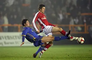 Ramsey Aaron Prints: Arsenal's Aaron Ramsey Scores Twice Against Portsmouth's Callum Reynolds in Reserves Clash