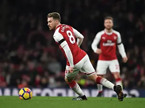 Arsenal's Aaron Ramsey Shines: Crushing Huddersfield Town in Premier League Clash