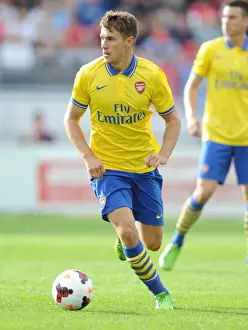 Arsenal's Aaron Ramsey Takes on Manchester City in Pre-Season Showdown, 2013
