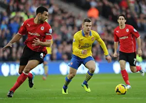 Arsenal's Aaron Ramsey Tangles with Steven Caulker in Premier League Clash (Cardiff City vs Arsenal, 2013)