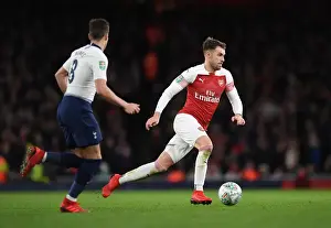 Arsenal V Tottenham Hotspur Carabao Cup 2018-19 Prints: Arsenal's Aaron Ramsey: Unwavering Focus in Carabao Cup Clash Against Tottenham