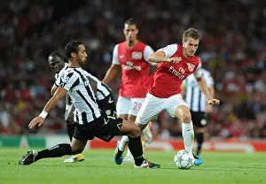 Arsenal V Udinese 2011-12 Prints: Arsenal's Aaron Ramsey vs. Medhi Benatia: Clash in the 2011 Champions League Play-Off