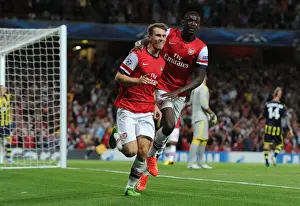 Arsenal's Aaron Ramsey and Yaya Sanogo Celebrate Goals in UEFA Champions League Play-offs Against Fenerbahce (2013)