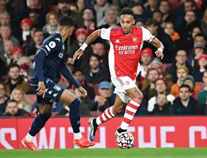 Arsenal's Abameyang Clashes with Aston Villa's Luis in Premier League Showdown