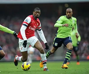 Arsenal V Aston Villa - 2012-13 Prints: Arsenal's Abou Diaby Clashes with Aston Villa's Fabian Delph in Premier League Showdown