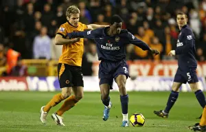 Wolverhampton Wanderers V Arsenal 2009-10 Prints: Arsenal's Abou Diaby Scores Twice Against Wolves Kevin Doyle in 1:4 Victory