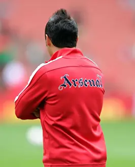 Arsenal V Aston Villa 2013-14 Prints: Arsenal's Agile Midfield Maestro: Santi Cazorla Gears Up for Battle Against Aston Villa (2013-14)