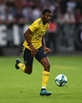 Angers SCO V Arsenal 2019-20 Prints: Arsenal's Ainsley Maitland-Niles in Action against Angers during 2019 Pre-Season Friendly