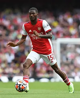 Arsenal's Ainsley Maitland-Niles in Action: Arsenal vs. Norwich City (2021-22 Premier League, Emirates Stadium)