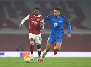Arsenal's Ainsley Maitland-Niles Breaks Past Molde's Omoijuanfo in Europa League Clash