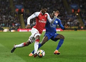 Leicester City v Arsenal 2017-18 Collection: Arsenal's Ainsley Maitland-Niles Clashes with Leicester's Fousseni Diabate in Premier League