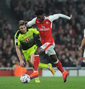 Arsenal V Reading EFL Cup 2016-17 Prints: Arsenal's Ainsley Maitland-Niles Clashes with Reading's George Evans in EFL Cup Showdown