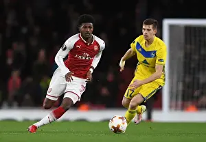 Arsenal V BATE Borisov 2017-18 Prints: Arsenal's Ainsley Maitland-Niles Faces Off Against BATE Borisov's Aleksei Rios