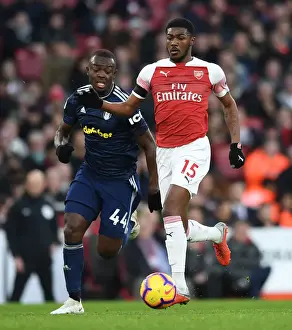 Arsenal V Fulham 2018-19 Prints: Arsenal's Ainsley Maitland-Niles Faces Off Against Fulham's Ibrahima Cisse