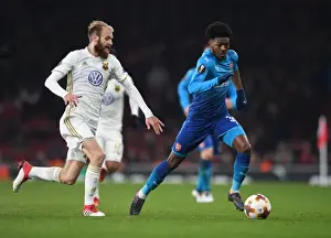 Arsenal V Östersunds FK 2017-18 Prints: Arsenal's Ainsley Maitland-Niles Faces Off Against Östersunds Curtis Edwards in Europa League Clash