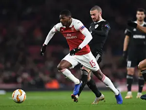 Arsenal V Qarabag 2018-19 Prints: Arsenal's Ainsley Maitland-Niles Faces Off Against Qarabag's Maksin Medvedev in Europa League Clash