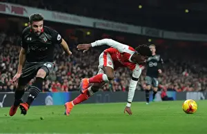 Arsenal V Southampton EFL Cup 2016-17 Prints: Arsenal's Ainsley Maitland-Niles Faces Off Against Southampton's Sam McQueen in EFL Cup Quarter-Final