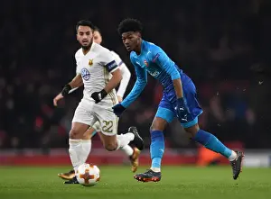 Arsenal V Östersunds FK 2017-18 Prints: Arsenal's Ainsley Maitland-Niles Goes Head-to-Head with Östersunds Brwa Nouri in Europa League Showdown
