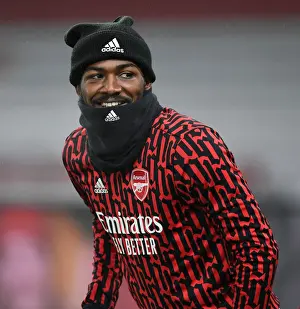 Arsenal's Ainsley Maitland-Niles Prepares for Palace Clash Amid Empty Emirates Stadium (Arsenal v Crystal Palace, 2021)