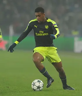 FC Basel V Arsenal 2016-17 Prints: Arsenal's Alex Iwobi in Action against FC Basel during the 2016-17 UEFA Champions League
