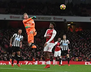 Arsenal V Newcastle United 2017-18 Prints: Arsenal's Alex Iwobi Challenges Newcastle's Rob Elliot in Premier League Clash