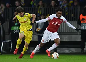 BATE Borisov V Arsenal 2018-19 Prints: Arsenal's Alex Iwobi Clashes with BATE Borisov's Dmitri Baga in Europa League Showdown
