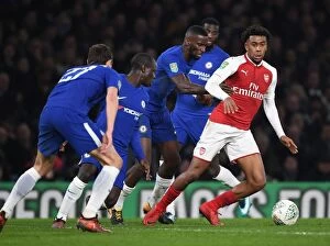Chelsea v Arsenal - Carabao Cup 1/2 final 1st leg 2017-18 Collection: Arsenal's Alex Iwobi Clashes with Chelsea's Rudiger and Kante in Carabao Cup Semi-Final
