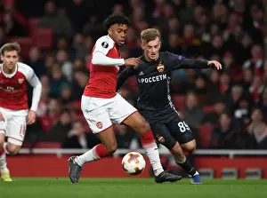 Arsenal's Alex Iwobi Clashes with CSKA Moscow's Konstantin Kuchaev in Europa League Quarterfinal