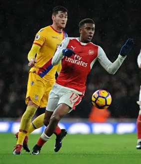 Arsenal V Crystal Palace 2016-17 Prints: Arsenal's Alex Iwobi Dashes Past Crystal Palace's Joel Ward in Premier League Clash