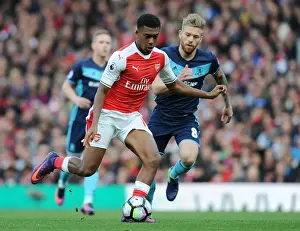 Arsenal's Alex Iwobi Dashes Past Middlesbrough's Adam Clayton in 2016-17 Premier League Clash