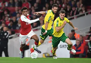 Arsenal V Norwich - Carabo Cup 4th Round 2017-18 Prints: Arsenal's Alex Iwobi Faces Off Against Norwich's Pinto and Zimmermann in Carabao Cup Clash