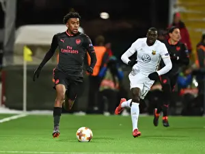 Ostersunds V Arsenal 2017-18 Prints: Arsenal's Alex Iwobi Faces Off Against Ostersunds Ken Sema in Europa League Clash