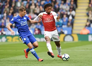 Leicester City V Arsenal 2018-19 Prints: Arsenal's Alex Iwobi Fends Off Leicester's Marc Albrighton in Intense Premier League Clash