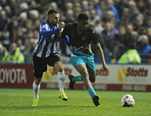 Sheffield Wednesday V Arsenal - Capital One Cup 2015-16 Prints: Arsenal's Alex Iwobi Goes Head-to-Head with Sheffield Wednesday's Jack Hunt in Capital One Cup Clash