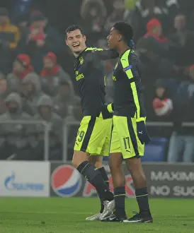 FC Basel V Arsenal 2016-17 Prints: Arsenal's Alex Iwobi and Granit Xhaka Celebrate Goals Against FC Basel in 2016-17 UEFA Champions League