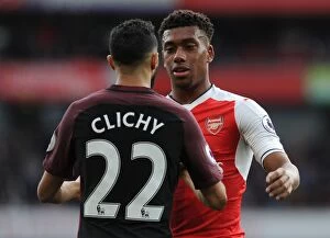 Images Dated 2nd April 2017: Arsenal's Alex Iwobi and Manchester City's Gael Clichy Share a Moment after Intense Rivalry