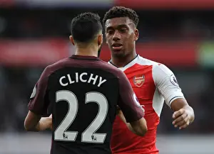 Arsenal V Manchester City 2016-17 Prints: Arsenal's Alex Iwobi and Manchester City's Gael Clichy Share a Moment after Intense Rivalry