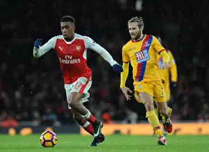 Arsenal V Crystal Palace 2016-17 Prints: Arsenal's Alex Iwobi Outmaneuvers Crystal Palace's Yohan Cabaye during the 2016-17 Premier League Match