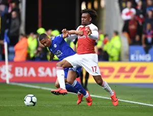 Leicester City V Arsenal 2018-19 Prints: Arsenal's Alex Iwobi Outsmarts Tielemans: A Premier League Battle of Wits (Leicester vs Arsenal)